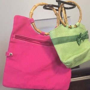 Two small bamboo handle handbags